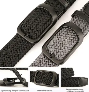 Detail of elastic braided belts with matte black buckles and reinforced leather ends
