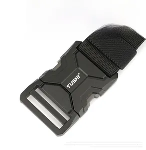 Detail of matte black zinc alloy buckle and durable nylon tactical belt texture