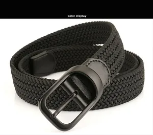 Detail of black elastic woven belt featuring a matte metal buckle and leather trim
