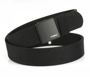 Detail of matte black zinc alloy tactical buckle with durable nylon webbing texture