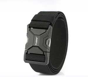 Detail of a black nylon tactical belt with a quick-release buckle and TUSHI branding