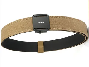 Close-up of dual-layer tactical belt with a quick-release buckle and TUSHI logo