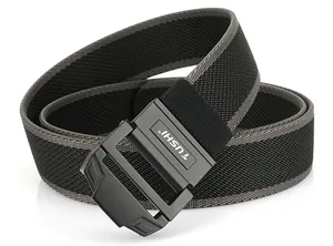 Close-up of the black and dark grey woven nylon elastic belt featuring the TUSHI buckle