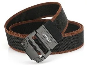 Macro view of nylon tactical belt buckle with TUSHI engraving and brown stitching