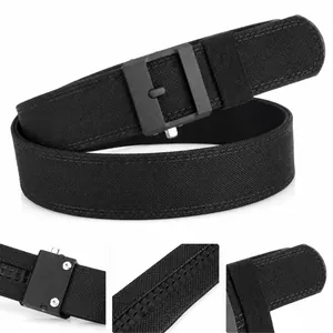 Detail of black tactical nylon belt with matte buckle and anti-slip inner texture