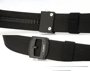Detail of matte black TUSHI buckle showing the adjustable mechanism for tactical nylon belt