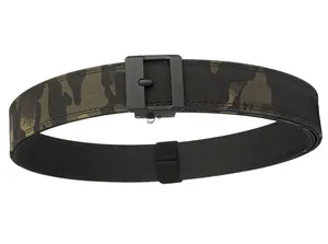 Detail of a tactical nylon belt featuring a woodland camouflage pattern and matte black buckle