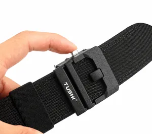 Close-up of the automatic buckle mechanism on black double-layer tactical nylon belt