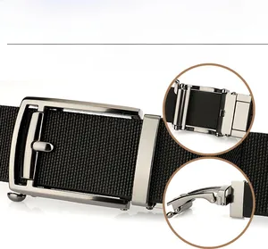 Detail of grey metal automatic buckle on black nylon belt with texture view