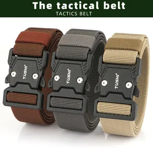 Close-up of tactical belts with quick-release metal buckles in brown, grey, and khaki nylon