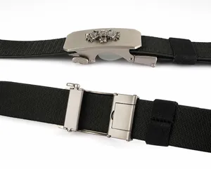 Detail of adjustable metal buckle with lion head relief on black woven elastic belt