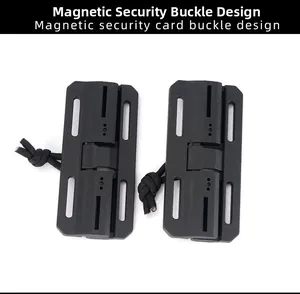 Macro detail of magnetic security card buckle with nylon cord for tactical gear