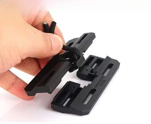 Detail of Black Gunpowder tactical buckle showing quick release functionality with rope attachment