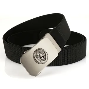 Detail of belt buckle with 3D embossed snake head and brushed silver finish