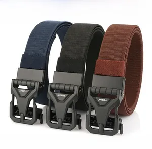 Detailed macro view showing three colors of durable nylon tactical belts with zinc alloy buckles
