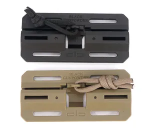 Quick release tactical buckle detail in black and tan with nylon cord and laser engraving