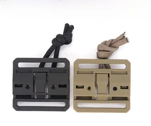 Detail of magnetic quick release buckles in black and khaki with woven pull cords