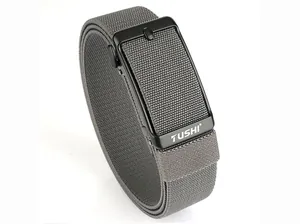 Detail of grey elastic woven belt with black matte automatic buckle and TUSHI logo