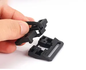 Detail showing the internal mechanism and assembly of the magnetic tactical quick release buckle