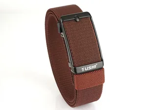 Detail of brown elastic woven belt with metal automatic buckle and TUSHI logo