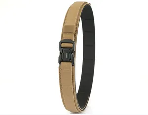 Close-up of durable khaki nylon tactical belt with quick-release buckle and TUSHI logo