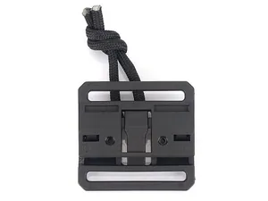 Close-up of black tactical magnetic buckle with nylon webbing slots and pull cord