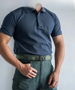 Detailed view of army green tactical nylon belt with black metal quick-release buckle on pants