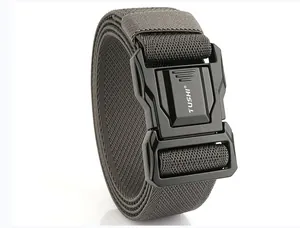 Close-up of tactical nylon belt with metal quick-release buckle and embossed TUSHI logo