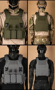 Detail of military plate carrier featuring laser-cut MOLLE system and quick-release buckles