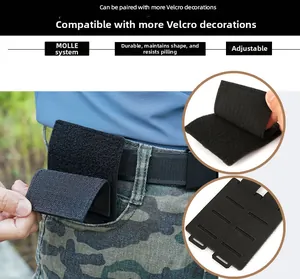 Tactical MOLLE morale patch panel adapter showing mounting clips and hook-loop surface