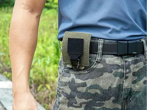 Tactical army green pouch with velcro and buckle attached to a black utility belt