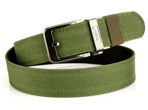 Macro shot of green nylon belt with textured weaving and silver metal buckle