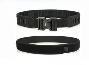 Detail of double-layer nylon tactical belt with laser-cut Molle system and metal buckle