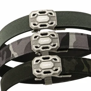 Detail of 1100D nylon tactical belts in olive green and camouflage with metal buckle