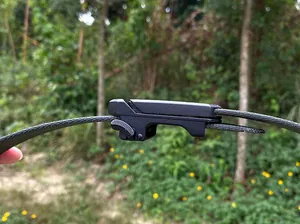 Detail of black tactical nylon belt buckle with non-slip texture for outdoor gear