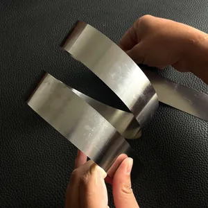 Close-up of a highly flexible stainless steel tactical belt showing elastic durability