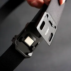 Close-up of the tactical nylon belt magnetic buckle showing the quick release locking system
