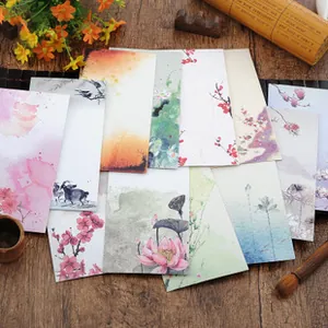 Macro shot of vintage Chinese style stationery envelopes with artistic floral patterns