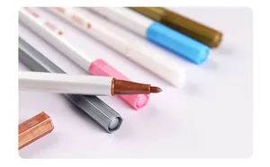 Macro shot of fine tip metallic paint markers in various colors for photo albums