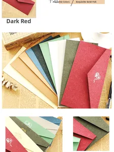 Detailed view of ten vintage textured envelopes with exquisite gold foil floral stamping