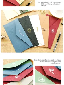 Close-up of vintage DL envelopes with gold foil stamping and thick 230g paper texture