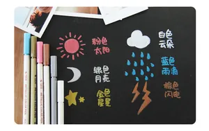 STA Metallic markers showing vibrant colors on black cardstock for DIY art projects