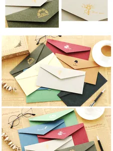 Detailed close-up of premium DL envelopes featuring gold foil patterns and elegant textures