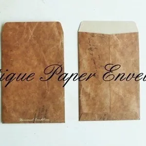Set of two vintage kraft paper envelopes with distressed texture and retro typography