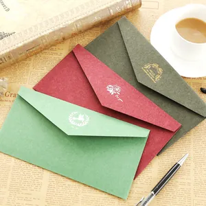 Vintage DL envelopes set in dark green and burgundy with gold foil stamped patterns