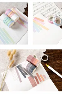 Macro shot of colorful Washi tape rolls with macaron colors and geometric patterns