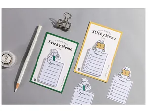 Detail of cute sticky notes set including Day's Plan and To Do List on grey background