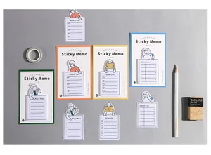 Close-up of four colorful time management sticky notes with creative female illustrations