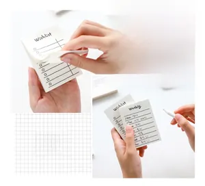 Detail view of mini weekly planner and wishlist notepad with minimalist line design