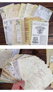 Detail of vintage scrapbooking paper set featuring newspaper and botanical illustrations